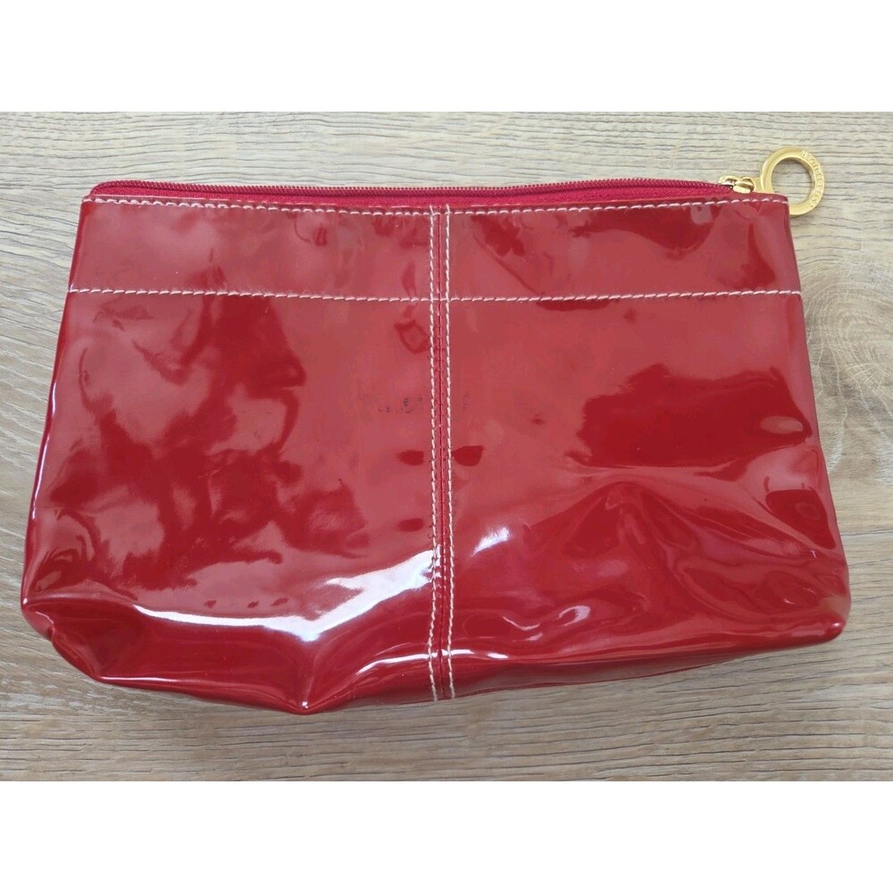 Read faux patent cosmetic bag Estée Lauder